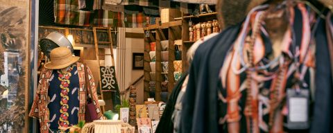a shop display featuring apparel, fabric and homewares